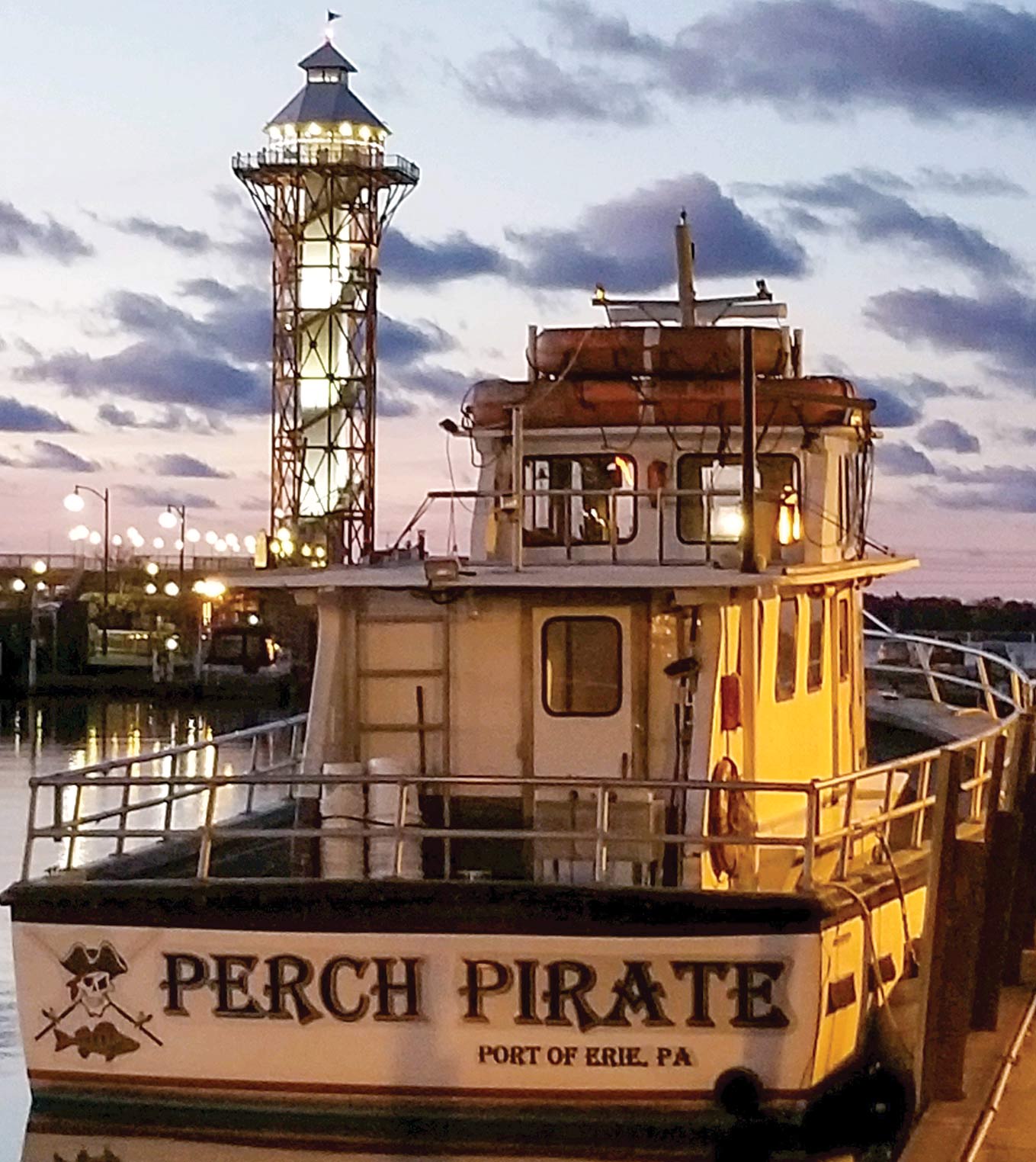 A portrait photograph of the Erie, Pa.-based Perch Pirate docked at sunset