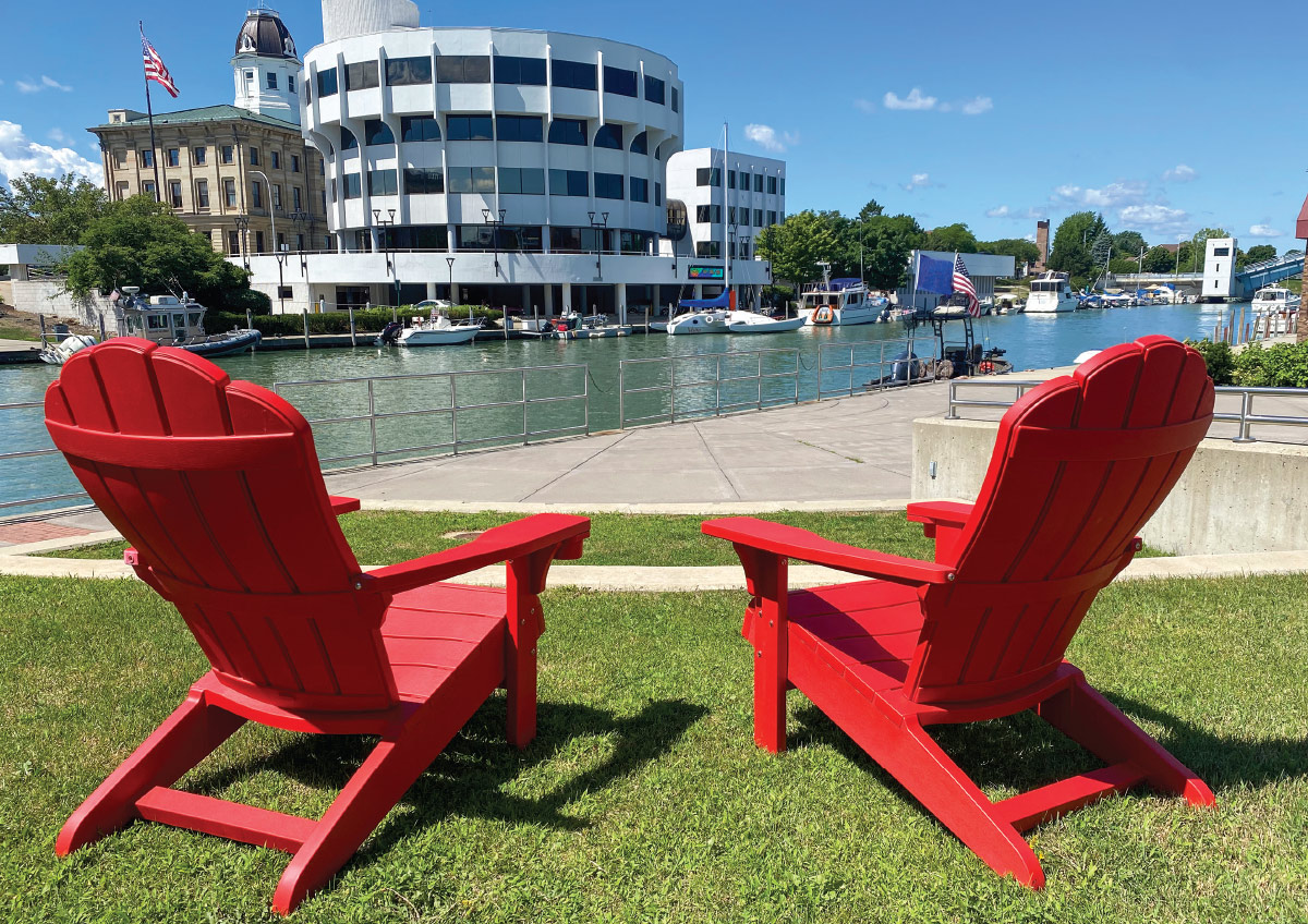 two lawn chairs facing the river in Downtown Port Huron, Mich.