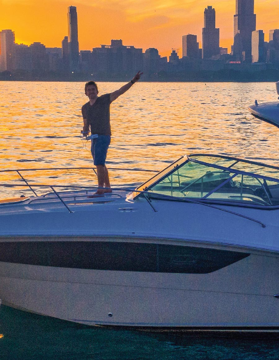 Man on a boat waving